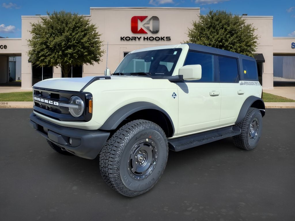 2025 Ford Bronco Outer Banks in Desert Sand — front three-quarter view