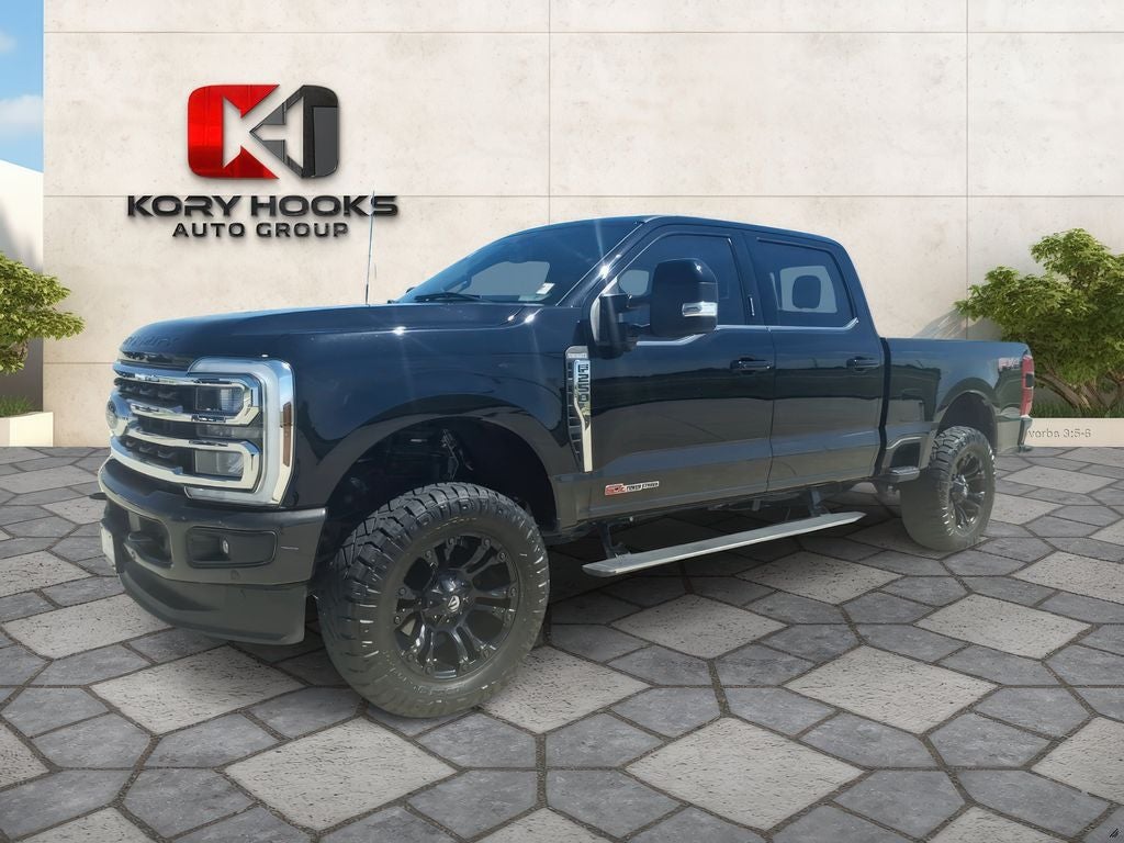 2024 Ford F-250SD King Ranch in Agate Black Metallic — front three-quarter view